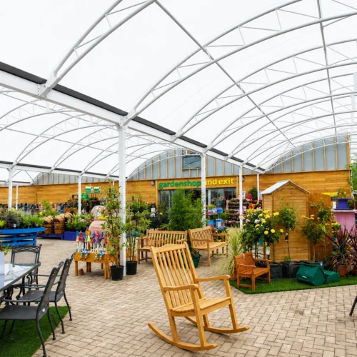 Bespoke garden centre entrance canopy creating a bright, welcoming and weather-protected customer experience