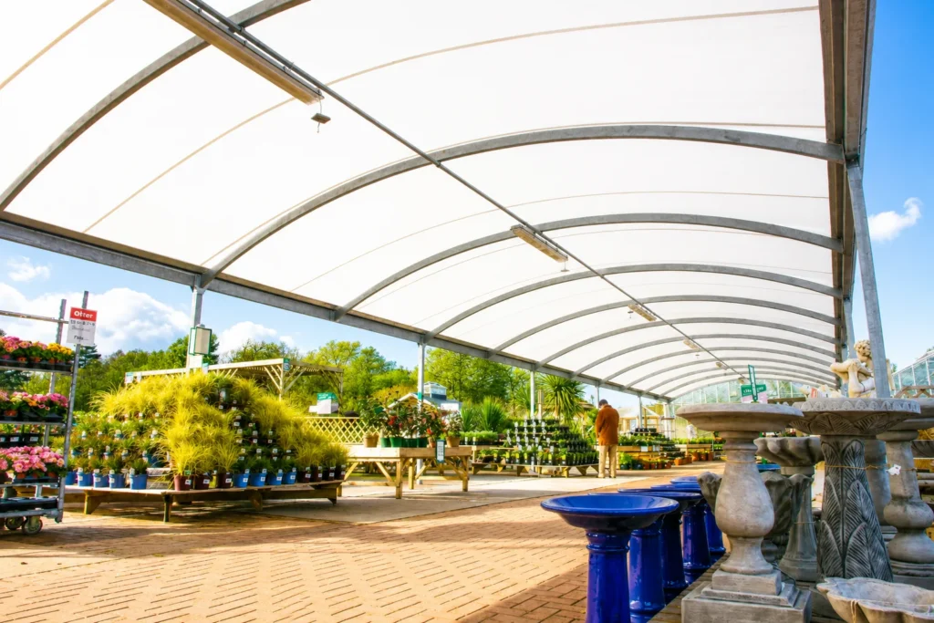 Chessington (2) Bespoke retail canopy providing all-weather covered display space at a garden centre